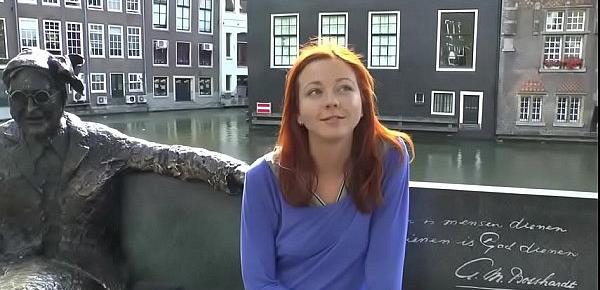  Pretty redhead walking naked in Amsterdam